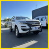 White holden colorado pickup with matte black nudge bar and chrome accents compatible with front sensors