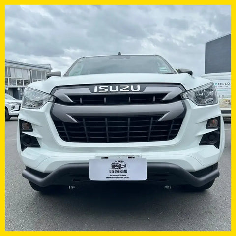 White isuzu d-max 2021-2023 pickup with black nudge bar compatible with front sensors and black grille and bumper