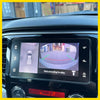 Black touchscreen display showing rearview camera and bird’s-eye view with safety text for medium triton nudge bar