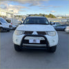 White mitsubishi triton with a matte black nudge bar compatible with front sensors for 2005-2015 models