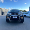 Black nissan navara np300 pickup truck with chrome nudge bar compatible with front sensors and illuminated headlights