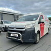 White toyota hiace van with red branding featuring a chrome nudge bar for toyota hiace 2019 plus models