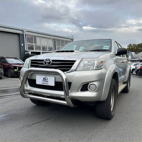 Silver toyota hilux pickup truck with chrome nudge bar and side steps for hilux vigo 2005-2015 use