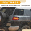 Back view of red and amber oled tail lights assembly with modern rectangular design on silver toyota fj cruiser suv