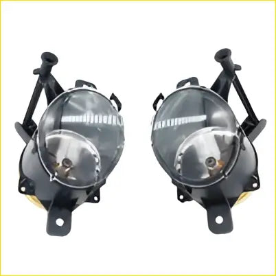 Pair of black plastic fog light assemblies with clear lenses and metallic housing fit for holden commodore ve vf series