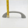 Gray plastic passenger roof grab handle with curved design and rounded ends for Toyota Hilux SR5 2004-2013