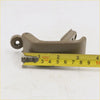 Beige plastic quarter glass lock latch for mazda bravo b2000 b2200 b2600 back side with circular hole and rectangular cutouts