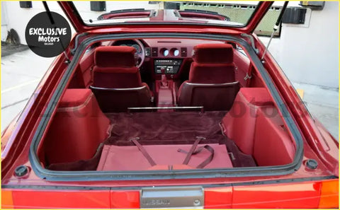 Rear boot trunk gas struts for red nissan 300zx 2+2 coupe with plush red interior and matching upholstery