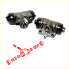 Two weathered gray metal rear brake cylinder drum assemblies with black rubber caps and fittings for mitsubishi minicab