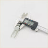 Digital caliper with black casing and silver jaws showing 10.56 mm measuring rear drum brake shoes adjuster for toyota hilux