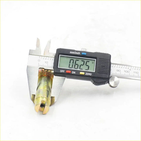 Brass-colored cylindrical rear drum brake shoes adjuster for Toyota Hilux measured at 0.625 inches by caliper