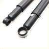 Rear black toyota hilux shock absorber with engraved model numbers and a silver metallic ring at the base