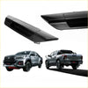 Black glossy plastic rear tailgate handle covers for toyota hilux revo 2015-2020 shown from the back side