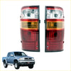 Red and amber rear tail lights with black trim designed for toyota hilux ln154 ln169 ln172 kzn165 d4d pickups