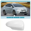 White plastic rearview mirror cover for right door of silver toyota prius c 2012-2018 shown from back side