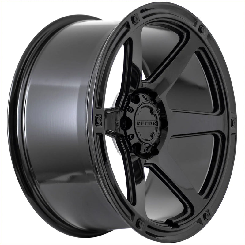 Recon armour gloss black alloy wheel with five-spoke design and recon branding on the center cap
