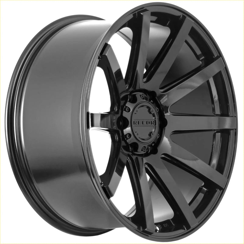Recon force gloss black alloy wheel with black gloss finish multi-spoke design and recon branding on center cap