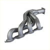 Gray metallic exhaust manifold with sleek curved tubes on the backside of redback dual 3 inch engine back exhaust for holden commodore