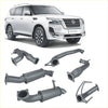 White nissan patrol y62 with redback extreme duty aftermarket exhaust system components shown from the back side