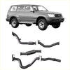 Black metal exhaust components showing the backside of redback extreme duty exhaust for toyota landcruiser 105 series