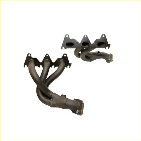 Black metal exhaust manifold with three tubes and mounting brackets for redback headers holden commodore 2004 to 2006