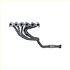Black and silver Redback Headers automotive exhaust manifold with four cylindrical inlets for Toyota Landcruiser