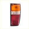 Rhs rear tail light for toyota hilux 1984-1988 showing black frame with orange clear and red lenses backside view
