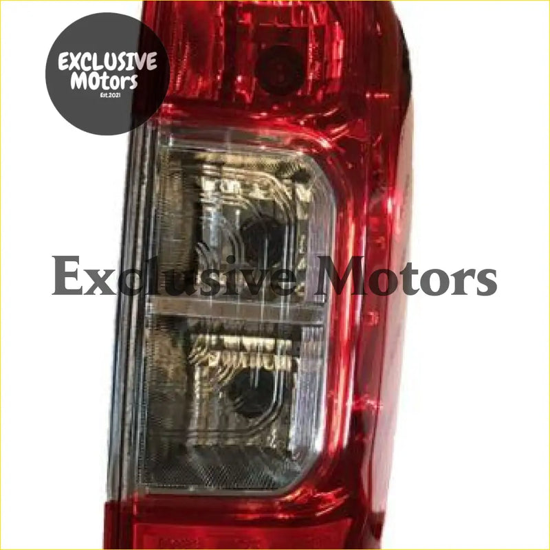 Right-hand tail light for Nissan Navara 2014-2019 with red and clear plastic modern angular design