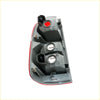 Back side of gray plastic right rear tail light for Toyota Hilux SR5 2011-2015 with red trim and three circular housings
