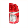 Right tail light for toyota hilux sr5 2011-2014 with red and clear plastic and chrome accent strip shown from back side