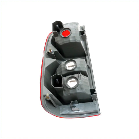 Right tail light for Toyota Hilux SR5 2011-2014 gray plastic with red trim and three circular light housings back view