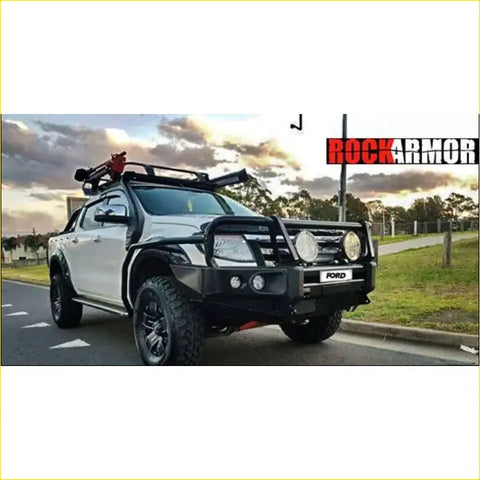 Black rockarmor brushbar with integrated round headlights and auxiliary lights for ford ranger 4wd ute offroad use