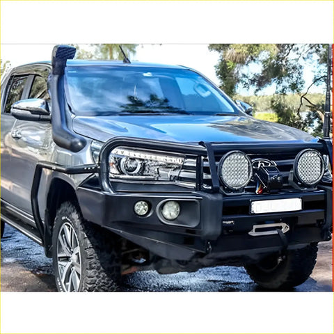 Black rugged rockarmor brushbar with aux lights and winch mount for toyota hilux n80 4wd ute offroad use