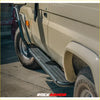 Black diamond plate steel side step with curved ends for rockarmor brushbar on beige ute 4wd offroad vehicle