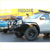 Silver isuzu mux ute with rockarmor elite hoop bullbar black bumper guard and rugged offroad 4wd tires