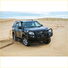 Black Toyota Land Cruiser Prado with rugged steel Rockarmor Elite bullbar featuring offroad lights for 4wd use