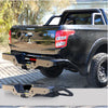 Back view of a black truck fitted with rockarmor elite steel rear step and elite rear tow for mitsubishi triton mq 2015 2018