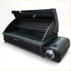 Rockarmor gas bbq is a black portable gas grill with stainless steel racks and a sleek modern design with hood