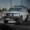 White toyota land cruiser 105 with black steel rockarmor gt hoop bullbar combo for offroad 4wd use