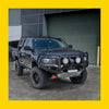 Black steel rockarmor gt hoop bullbar with three off-road lights on lifted isuzu mux 2020-2024 front end