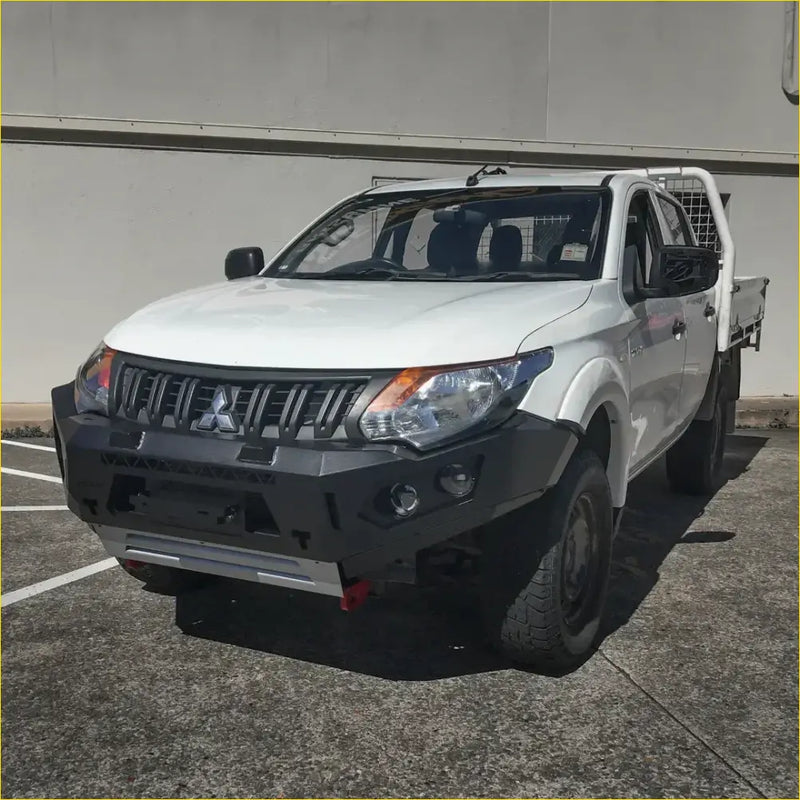 White mitsubishi triton ute with rockarmor gt hoopless steel bullbar featuring black bumper and chrome accents for offroad 4wd