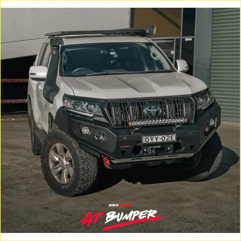 White toyota land cruiser prado with black rockarmor gt hoopless steel bullbar and roof rack for offroad 4wd use