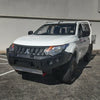 White mitsubishi triton 4wd ute with black rockarmor gt steel hoopless bullbar combo for offroad durability