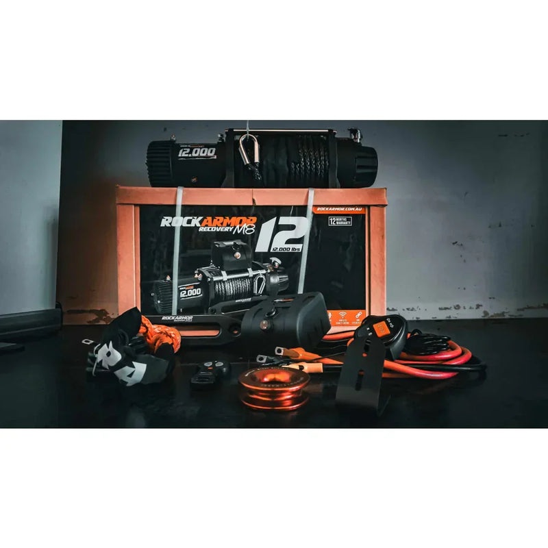 Black rockarmor premium 12,000 lbs 4wd electric winch with synthetic rope and orange accents for offroad ute use