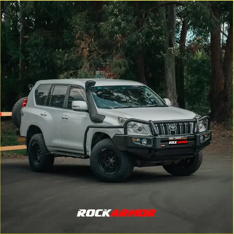 Silver toyota land cruiser prado fj150 with black rockarmor premium steel bullbar for tough 4wd offroad use