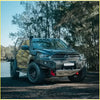 Black mazda bt50 ute with rockarmor gt hoopless bullbar and rock sliders perfect for 4wd offroad adventures
