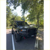 Black rugged toyota prado 250 suv with gt hoop bullbar roof rack and rock sliders from rockarmor rock pack