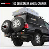 Back view of black rockarmor steel dual wheel carrier with two spare tires on a 4wd toyota landcruiser offroad