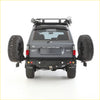 Black toyota land cruiser gxl with rugged offroad tires and rockarmor steel dual wheel carrier for 4wd ute fans