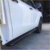 Black glossy rockarmor steel rockslider side step rail mounted on white mazda bt50 dual cab ute for offroad 4wd use